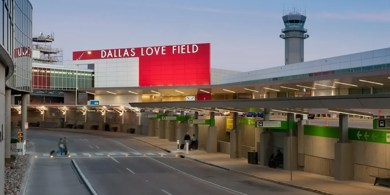 a large red sign with the words love field on it at The  Dahlia