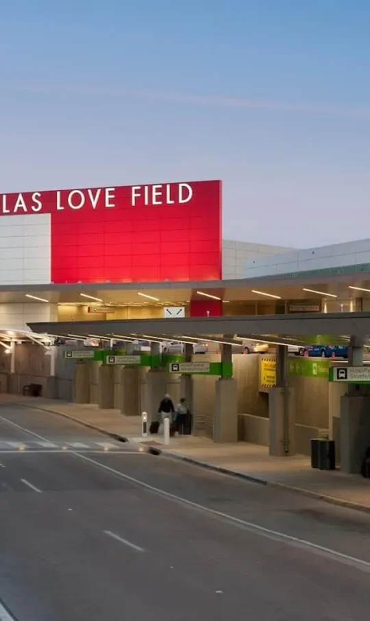 a large red sign with the words love field on it at The  Dahlia